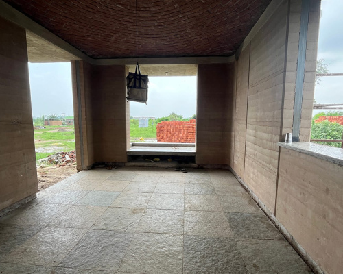 Interior of a monk cottage. Floor tiles are an inexpensive regional stone called Kota stone.